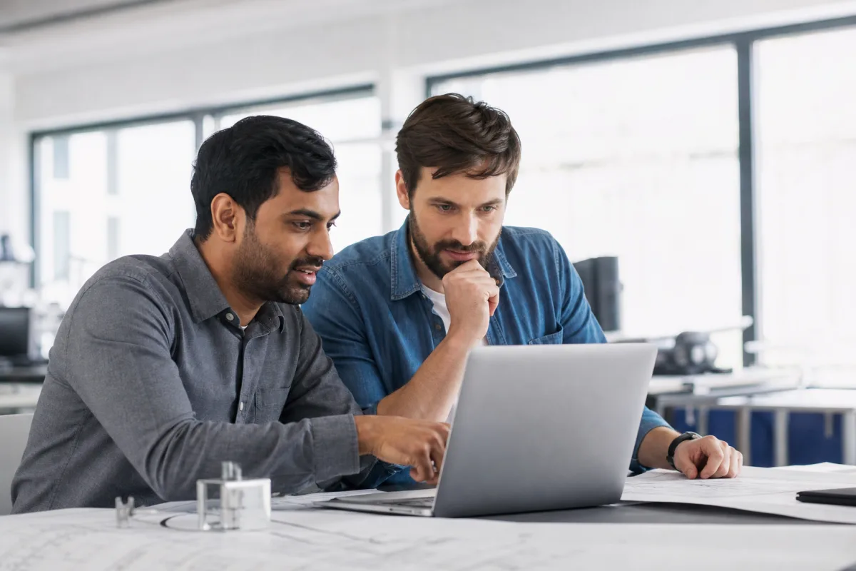 Engineers collaborating in a modern German office